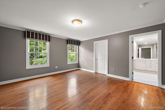 400 Hamilton Rd, Bloomfield, MI 48301 - unfurnished bedroom featuring ornamental molding, wood finished floors, and ensuite bath