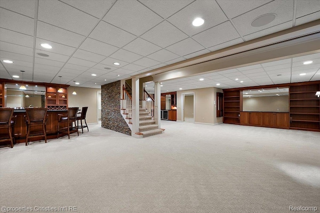 400 Hamilton Rd, Bloomfield, MI 48301 - living area with bar area, stairs, carpet, built in shelves, and recessed lighting