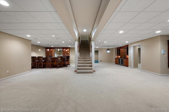 400 Hamilton Rd, Bloomfield, MI 48301 - living room with bar area, light colored carpet, recessed lighting, and a drop ceiling
