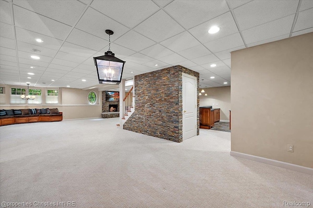 400 Hamilton Rd, Bloomfield, MI 48301 - unfurnished living room with carpet, stairs, a paneled ceiling, recessed lighting, and a fireplace