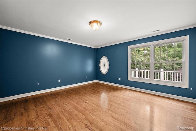 400 Hamilton Rd, Bloomfield, MI 48301 - spare room featuring ornamental molding and wood finished floors