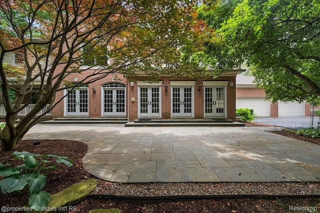 400 Hamilton Rd, Bloomfield, MI 48301 - back of house with french doors and brick siding