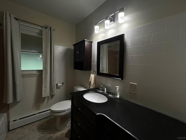 2682 Elmwood Dr, Adrian, MI 49221 - bathroom featuring a baseboard radiator, vanity, tile walls, and a shower