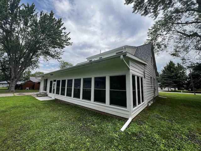 2682 Elmwood Dr, Adrian, MI 49221 - view of side of property featuring a yard