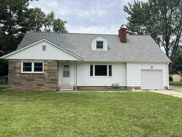 2682 Elmwood Dr, Adrian, MI 49221 - view of front of house with a chimney, a shingled roof, an attached garage, and concrete driveway
