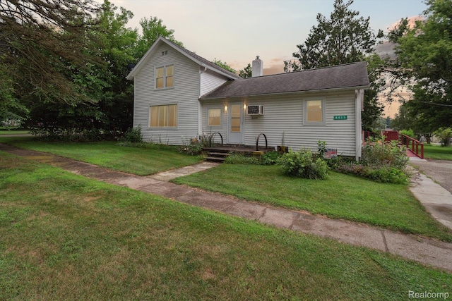 4415 Central St, Columbiaville, MI 48421 - traditional home featuring a front yard and a chimney