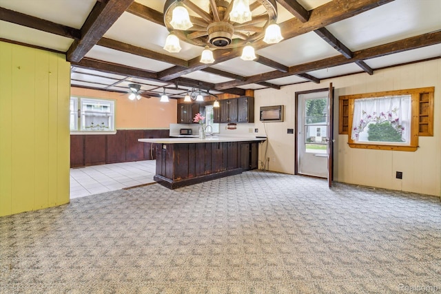 4415 Central St, Columbiaville, MI 48421 - kitchen featuring coffered ceiling, dark brown cabinets, plenty of natural light, light countertops, and a peninsula