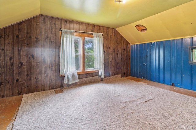 4415 Central St, Columbiaville, MI 48421 - bonus room featuring lofted ceiling, wooden walls, and carpet floors