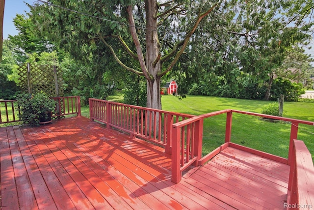 4415 Central St, Columbiaville, MI 48421 - deck with a shed, a yard, and view of wooded area