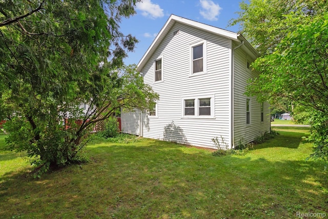 4415 Central St, Columbiaville, MI 48421 - view of property exterior featuring a lawn
