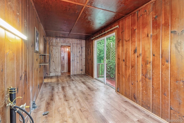 4415 Central St, Columbiaville, MI 48421 - empty room featuring wood walls and wood finished floors