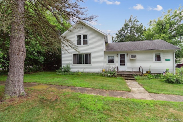4415 Central St, Columbiaville, MI 48421 - traditional-style home featuring a front lawn and roof with shingles