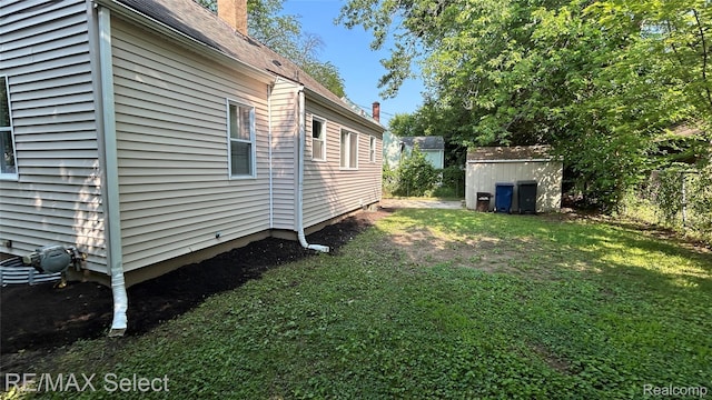 1902 Crestbrook Ln, Flint, MI 48507 - view of green lawn with a shed