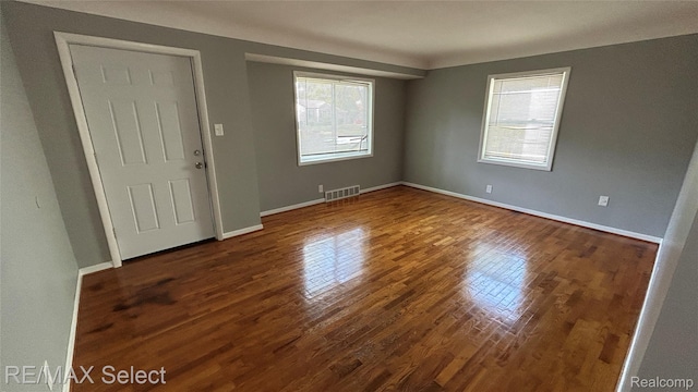 1902 Crestbrook Ln, Flint, MI 48507 - unfurnished room with plenty of natural light and wood finished floors