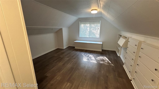 1902 Crestbrook Ln, Flint, MI 48507 - additional living space with wood finished floors and lofted ceiling