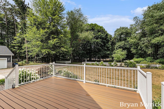 4675 44th St, Holland, MI 49423 - wooden terrace with view of wooded area