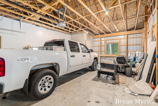 4675 44th St, Holland, MI 49423 - garage featuring a garage door opener