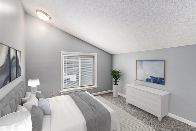 4675 44th St, Holland, MI 49423 - carpeted bedroom featuring vaulted ceiling and a textured ceiling
