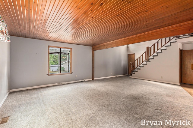 4675 44th St, Holland, MI 49423 - carpeted empty room with wooden ceiling and stairway