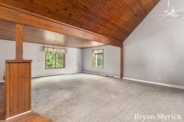 4675 44th St, Holland, MI 49423 - unfurnished living room with lofted ceiling, carpet flooring, a ceiling fan, and wood ceiling