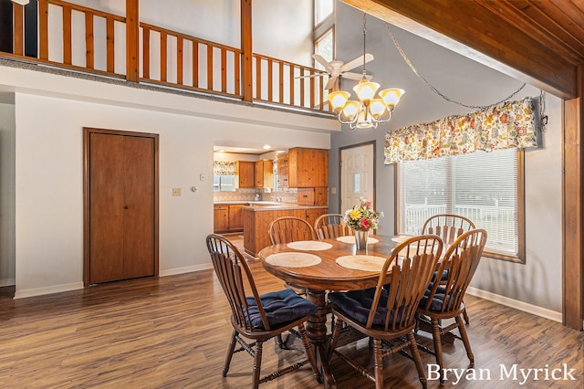 4675 44th St, Holland, MI 49423 - dining space with a chandelier, wood finished floors, and a high ceiling