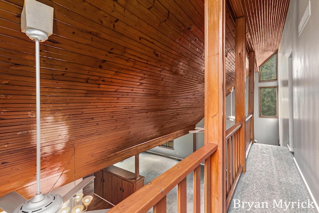 4675 44th St, Holland, MI 49423 - hallway with carpet flooring, wood ceiling, lofted ceiling, and an upstairs landing
