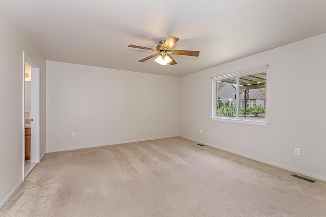 6602 Robindale Dr, Ypsilanti, MI 48197 - empty room with light carpet and a ceiling fan