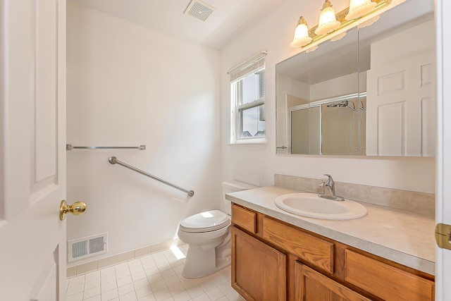 6602 Robindale Dr, Ypsilanti, MI 48197 - full bath with vanity, an enclosed shower, and tile patterned floors