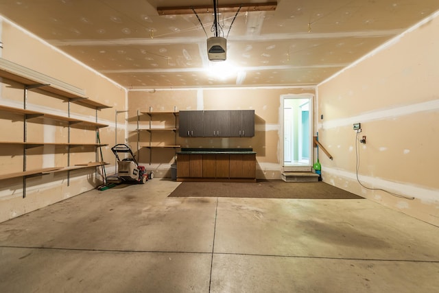 6602 Robindale Dr, Ypsilanti, MI 48197 - garage featuring a garage door opener