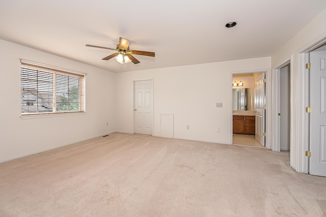 6602 Robindale Dr, Ypsilanti, MI 48197 - unfurnished bedroom featuring light colored carpet, ensuite bath, and ceiling fan