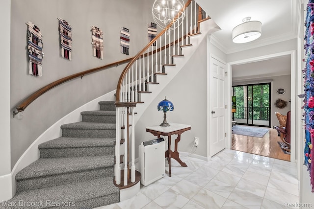 1109 Ivyglen Cir, Bloomfield Hills, MI 48304 - stairway with ornamental molding, marble finish floors, and a chandelier