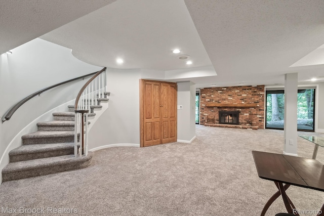 1109 Ivyglen Cir, Bloomfield Hills, MI 48304 - unfurnished living room with carpet flooring, stairs, recessed lighting, a fireplace, and a textured ceiling