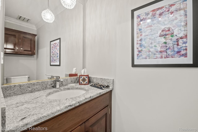 1109 Ivyglen Cir, Bloomfield Hills, MI 48304 - bathroom with vanity, crown molding, and a chandelier
