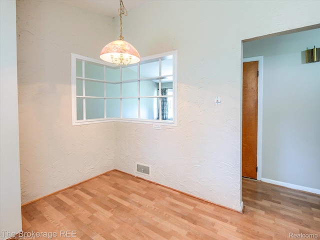 515 Juniper Dr, Davison, MI 48423 - spare room with wood finished floors
