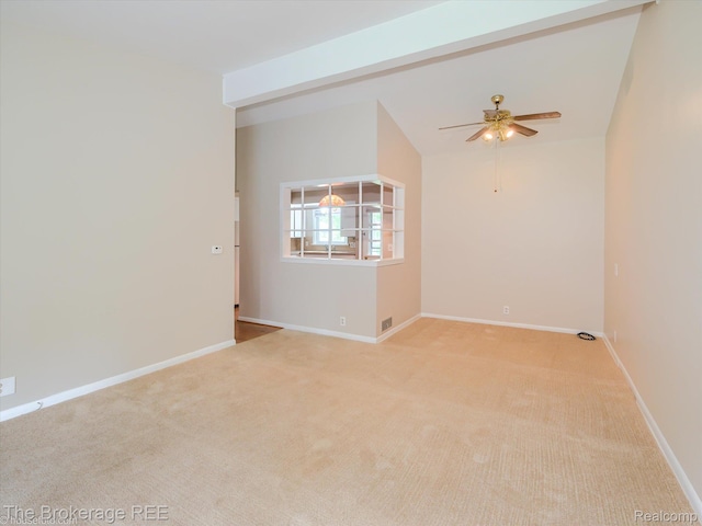 515 Juniper Dr, Davison, MI 48423 - unfurnished room with vaulted ceiling, carpet floors, and a ceiling fan