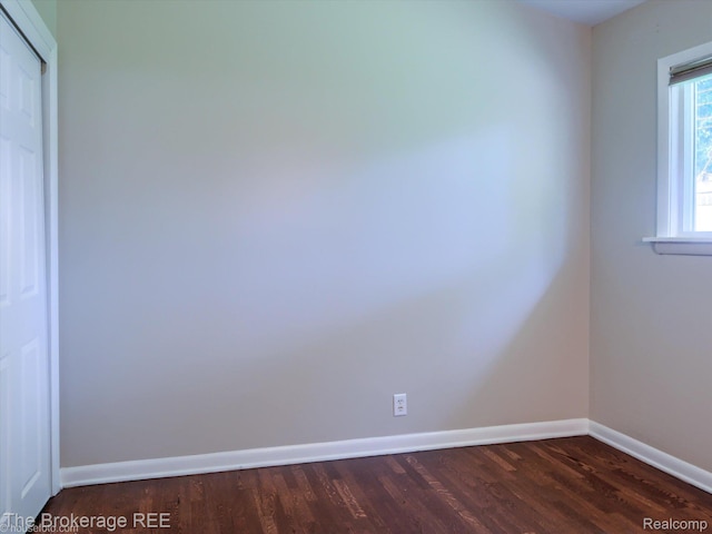515 Juniper Dr, Davison, MI 48423 - spare room with dark wood-style flooring and baseboards