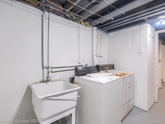 515 Juniper Dr, Davison, MI 48423 - washroom featuring washer and dryer and concrete block wall