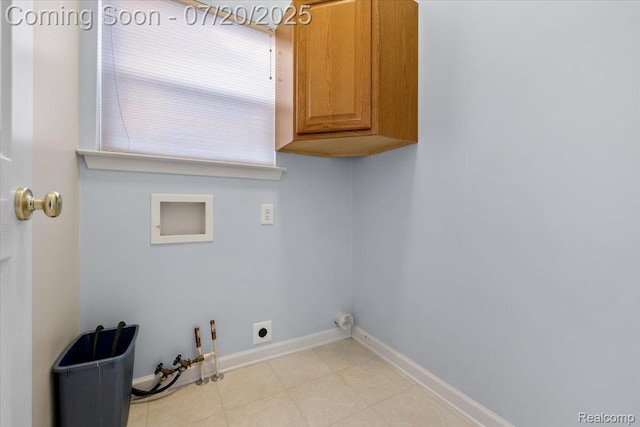 1145 York Ave, Howell, MI 48843 - laundry room with cabinet space, hookup for a gas dryer, hookup for a washing machine, and electric dryer hookup