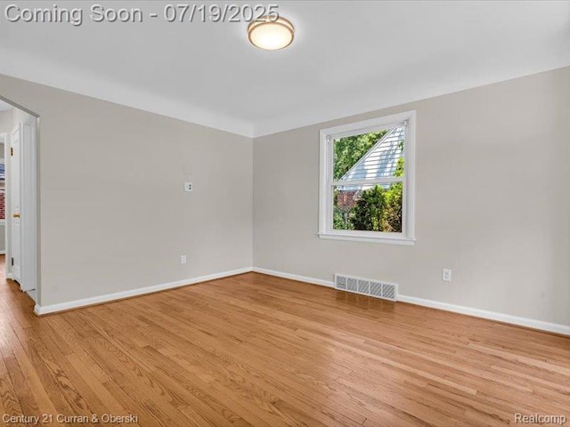 3850 Parker St, Dearborn, MI 48124 - empty room with light wood-style flooring and baseboards
