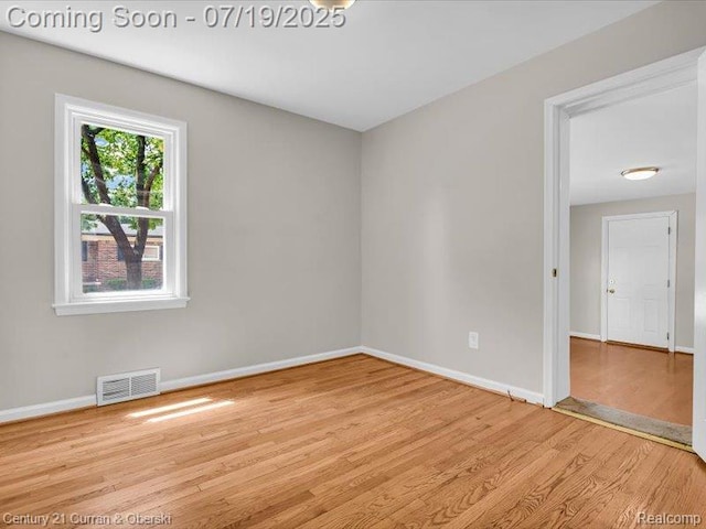 3850 Parker St, Dearborn, MI 48124 - unfurnished room featuring wood finished floors and baseboards