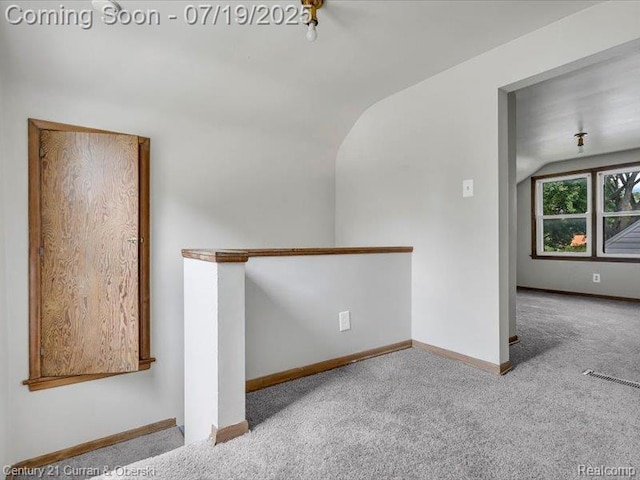 3850 Parker St, Dearborn, MI 48124 - unfurnished room featuring carpet flooring and vaulted ceiling