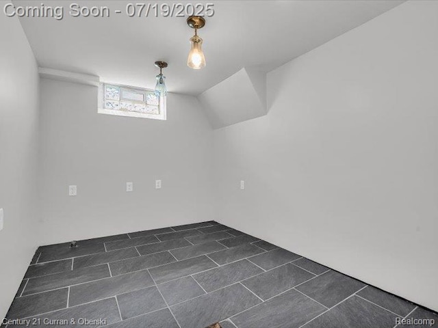 3850 Parker St, Dearborn, MI 48124 - bonus room featuring dark tile patterned flooring