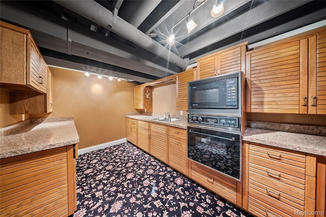 8931 Bridge Rd, Grosse Ile, MI 48138 - kitchen featuring black appliances, track lighting, light countertops, and dark colored carpet