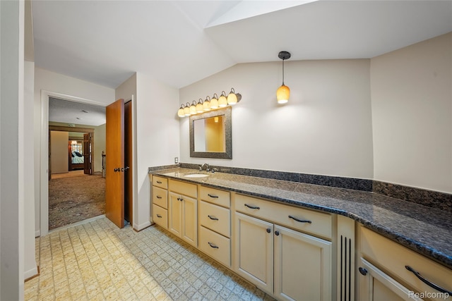 8931 Bridge Rd, Grosse Ile, MI 48138 - bathroom featuring vanity, lofted ceiling, and tile patterned floors