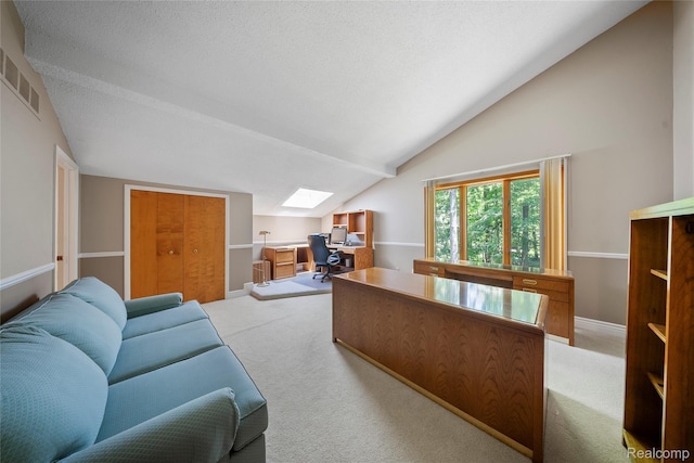 8931 Bridge Rd, Grosse Ile, MI 48138 - living area featuring lofted ceiling, carpet, an office area, a skylight, and a textured ceiling