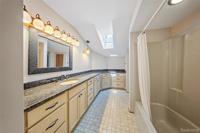 8931 Bridge Rd, Grosse Ile, MI 48138 - bathroom with a skylight, vanity, vaulted ceiling, and shower / tub combo