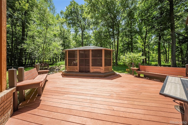 8931 Bridge Rd, Grosse Ile, MI 48138 - wooden terrace with a sunroom