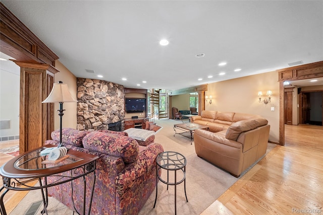 8931 Bridge Rd, Grosse Ile, MI 48138 - living area with decorative columns, light wood-style floors, and recessed lighting