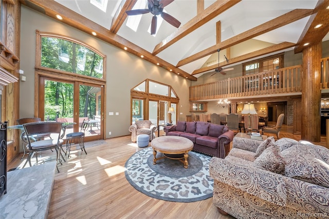 8931 Bridge Rd, Grosse Ile, MI 48138 - living area featuring high vaulted ceiling, ceiling fan, recessed lighting, beam ceiling, and wood finished floors