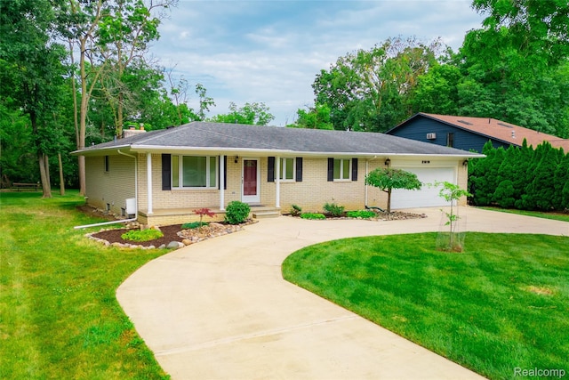 21819 Meridian Rd, Grosse Ile, MI 48138 - view of front facade with brick siding, driveway, an attached garage, a front yard, and a shingled roof